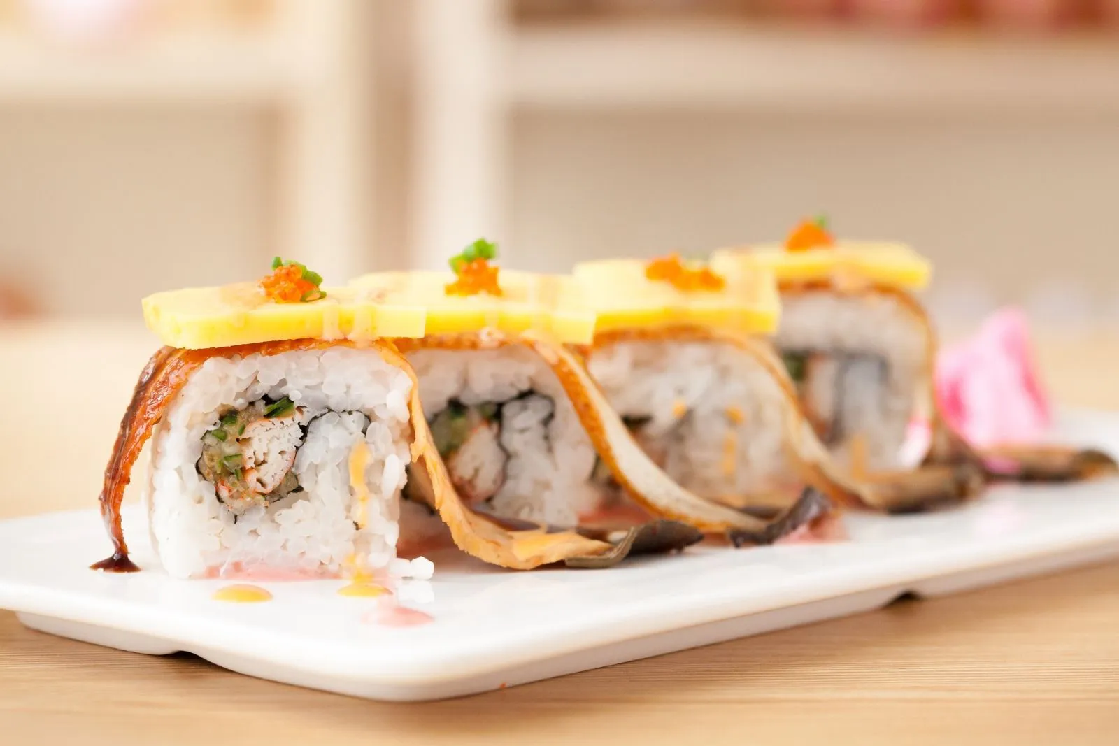 Mango eel sushi roll with spicy sauce at Memories of Japan Restaurant in Broken Arrow